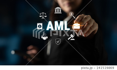 Focused Business Professional Working on Anti-Money Laundering Strategy with Illuminated Icons Representing Finance Law and Compliance Concepts. Glyphic Focused Business Professional Working on Anti-Money Laundering Strategy with Illuminated Icons Representing Finance Law and Compliance Concepts. Glyphic 141519869