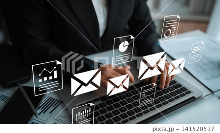 Business professional using laptop with digital icons representing emails, reports, graphs, and documents in a modern office environment Gluon Business professional using laptop with digital icons representing emails, reports, graphs, and documents in a modern office environment Gluon 141520517