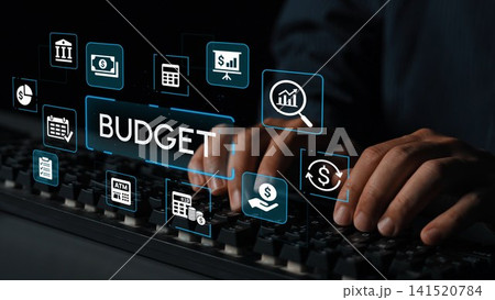 Hands Typing on Keyboard with Budgeting Graphics and Financial Icons for Personal Finance Management and Investment Planning Concepts. Entropy 141520784