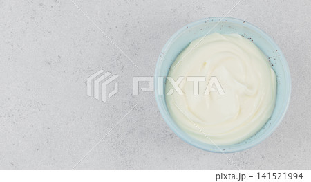Plain Greek Yogurt In Ceramic Bowl Top View 141521994