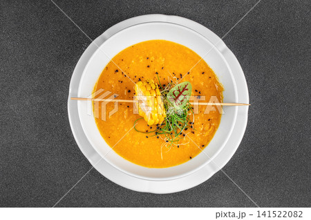 Creamy Corn Soup with Microgreens Top View Creamy Corn Soup with Microgreens Top View 141522082