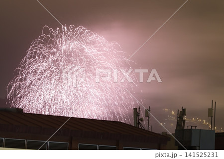 Fireworks exhibition in a summer night 141525231
