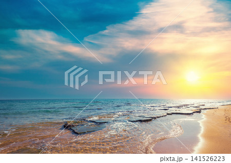 Rocky coast in summer. Beautiful seascape. Sunset beach Rocky coast in summer. Beautiful seascape. Sunset beach 141526223