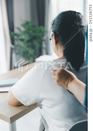 Healthcare worker using stethoscope on patient back during clinic examination, respiratory checkup, lung assessment, diagnosis, treatment, and professional medical care concept. 141526753