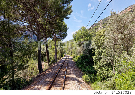 Vintage train in Soller, Mallorca, Spain - on the way to Soller - public transport transit transportation railway Vintage train in Soller, Mallorca, Spain - on the way to Soller - public transport transit transportation railway 141527028