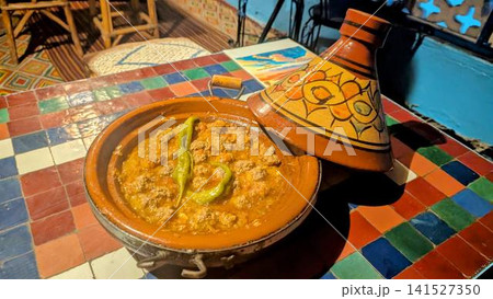 Opened Moroccan Kefta Meatball Tagine with Decorative Lid Opened Moroccan Kefta Meatball Tagine with Decorative Lid 141527350
