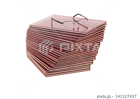 Stack of books on a white background Stack of books on a white background 141527437