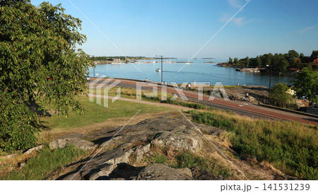 Coastal Park and Marina with Bicycles on Sunny Day Coastal Park and Marina with Bicycles on Sunny Day 141531239