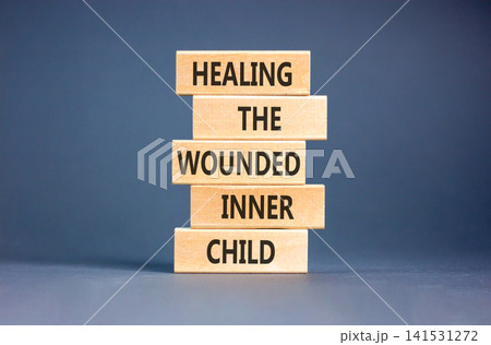 Healing the wounded inner child symbol. Concept words Healing the wounded inner child on beautiful wooden blocks. Beautiful grey background. Psychological Healing inner child concept. Copy space. Healing the wounded inner child symbol. Concept words Healing the wounded inner child on beautiful wooden blocks. Beautiful grey background. Psychological Healing inner child concept. Copy space. 141531272