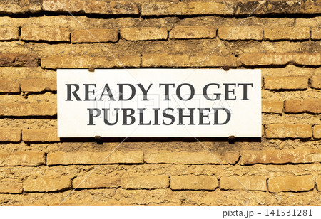 Ready to get published symbol. Concept words Ready to get published on beautiful white sign plate. Beautiful brick wall background. Business ready to get published motivational concept. Copy space Ready to get published symbol. Concept words Ready to get published on beautiful white sign plate. Beautiful brick wall background. Business ready to get published motivational concept. Copy space 141531281