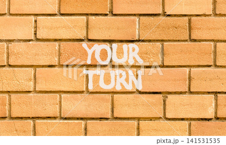 Your turn words symbol. Concept words Your turn on beautiful brick wall. Beautiful brick wall background. Business your turn motivational support concept. Copy space. Your turn words symbol. Concept words Your turn on beautiful brick wall. Beautiful brick wall background. Business your turn motivational support concept. Copy space. 141531535