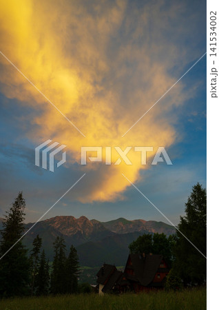 Colorful sunset sky. Amazing nature background. Evening adventure hiking Colorful sunset sky. Amazing nature background. Evening adventure hiking 141534002