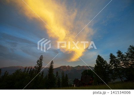 Colorful sunset sky. Amazing nature background. Evening adventure hiking Colorful sunset sky. Amazing nature background. Evening adventure hiking 141534006