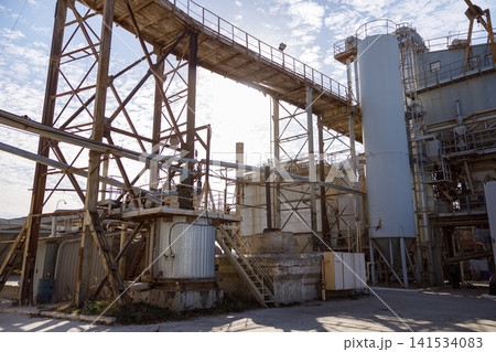 Industrial Plant with Pipes, Steel Structures, and Storage Tanks Industrial Plant with Pipes, Steel Structures, and Storage Tanks 141534083