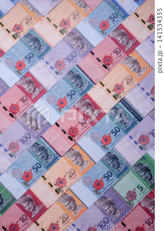 Malaysian ringgit banknotes as a tool for trade and financial transactions. The Malaysian ringgit 141534355