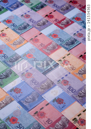 Malaysian ringgit banknotes as a tool for trade and financial transactions. The Malaysian ringgit 141534363