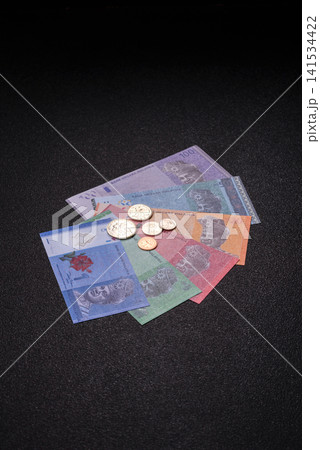Malaysian ringgit banknotes as a tool for trade and financial transactions. The Malaysian ringgit 141534422