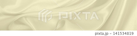 Smooth elegant golden silk or satin luxury cloth texture as wedding background. Luxurious background design. In Sepia toned. Retro style Smooth elegant golden silk or satin luxury cloth texture as wedding background. Luxurious background design. In Sepia toned. Retro style 141534819