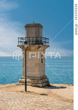 Historic stone lighthouse by the sea in Rovinj, Croatia. Historic stone lighthouse by the sea in Rovinj, Croatia. 141535226