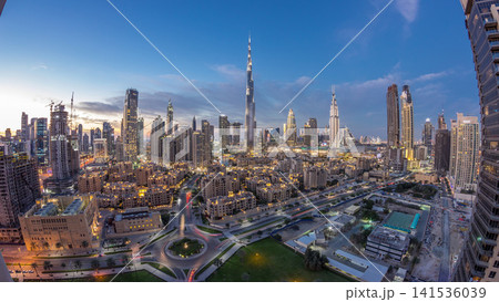 Dubai Downtown skyline day to night timelapse with Burj Khalifa and other towers panoramic view from the top in Dubai Dubai Downtown skyline day to night timelapse with Burj Khalifa and other towers panoramic view from the top in Dubai 141536039