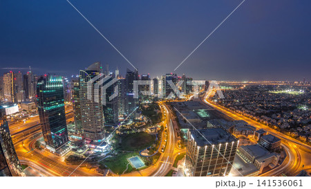 Jumeirah Lake Towers residential district aerial day to night timelapse near Dubai Marina 141536061