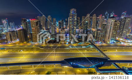 Aerial top view day to night timelapse of Dubai Marina and JLT in Dubai, UAE Aerial top view day to night timelapse of Dubai Marina and JLT in Dubai, UAE 141536118