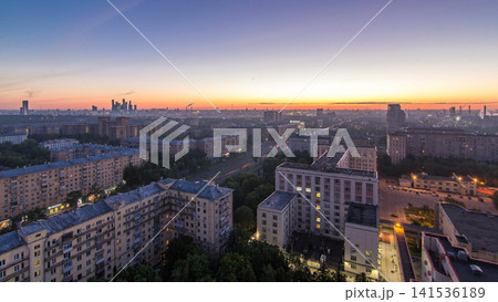 Residential buildings, Stalin skyscrapers and panorama of city before sunrise night to day timelapse in Moscow, Russia 141536189