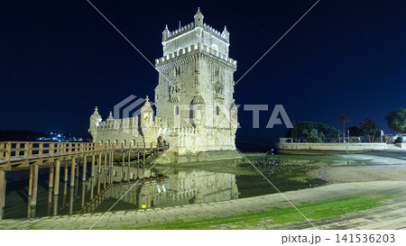 Belem Tower on Tagus River night timelapse hyperlapse. Lisbon, Portugal. 141536203