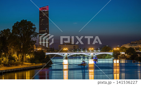 Seville skyline day to night timelapse with Torre Sevilla and Triana Bridge Seville skyline day to night timelapse with Torre Sevilla and Triana Bridge 141536227