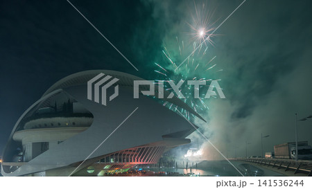 Aerial timelapse of the Palau de les Arts Reina Sofia in Valencia during a fireworks show. Spain Aerial timelapse of the Palau de les Arts Reina Sofia in Valencia during a fireworks show. Spain 141536244