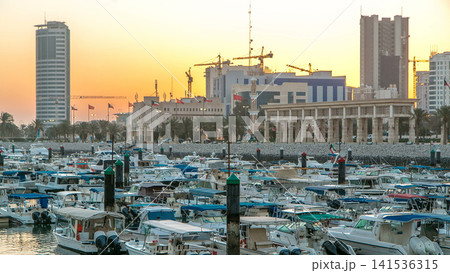 Yachts and boats at the Sharq Marina night to day timelapse in Kuwait. Kuwait City, Middle East Yachts and boats at the Sharq Marina night to day timelapse in Kuwait. Kuwait City, Middle East 141536315