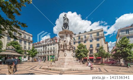 Camoes Monument in Luis de Camoes Square in the Chiado neighborhood timelapse hyperlapse. Lisbon, Portugal Camoes Monument in Luis de Camoes Square in the Chiado neighborhood timelapse hyperlapse. Lisbon, Portugal 141536341