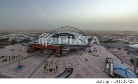 Aerial view of Aspire Zone stadium from top night to day timelapse in Doha 141536429