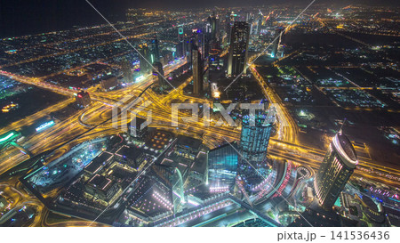 Dubai downtown day to night transition with city lights from above timelapse Dubai downtown day to night transition with city lights from above timelapse 141536436