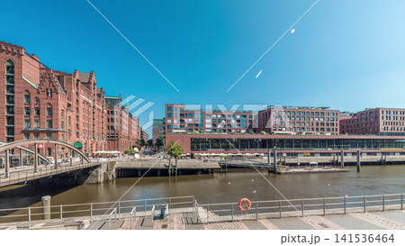 Panorama showing famous old Speicherstadt in Hamburg timelapse featuring the International Maritime Museum, Germany 141536464