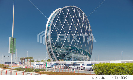 Circular skyscraper Aldar Headquarters Building timelapse in Abu Dhabi, UAE. Circular skyscraper Aldar Headquarters Building timelapse in Abu Dhabi, UAE. 141536509