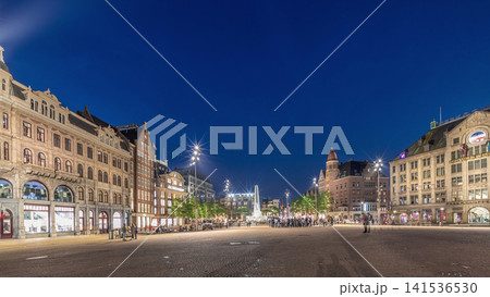 The Dam square in Amsterdam day to night timelapse panorama, The Netherlands. The Dam square in Amsterdam day to night timelapse panorama, The Netherlands. 141536530