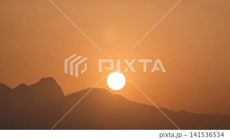 Seascape timelapse of high mountains over clear sunset sky in Turkey Seascape timelapse of high mountains over clear sunset sky in Turkey 141536534