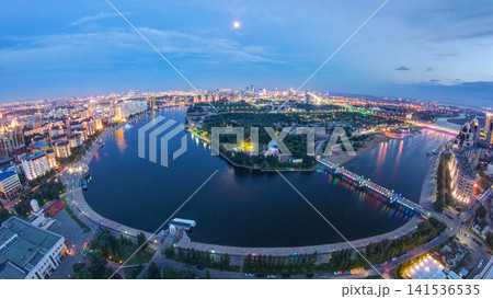 Elevated view over the city center with river and park and central business district day to night Timelapse, Kazakhstan, Astana Elevated view over the city center with river and park and central business district day to night Timelapse, Kazakhstan, Astana 141536535