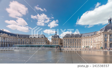 Place de la Bourse and Miroir d'eau timelapse hyperlapse in Bordeaux, France, reflecting historic architecture Place de la Bourse and Miroir d'eau timelapse hyperlapse in Bordeaux, France, reflecting historic architecture 141536557