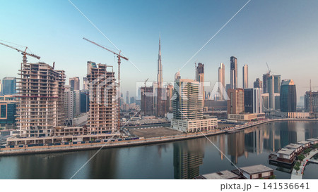The rhythm of the city of Dubai from night to morning aerial timelapse The rhythm of the city of Dubai from night to morning aerial timelapse 141536641