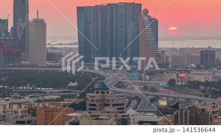 View of modern buildings in luxury Dubai city at sunset aerial timelapse 141536644