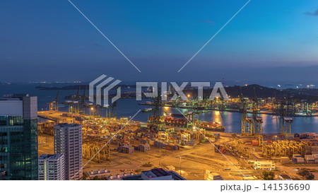 Commercial port of Singapore aerial day to night timelapse. 141536690