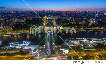 Aerial view over Trocadero day to night timelapse with the Palais de Chaillot seen from the Eiffel Tower in Paris, France. 141536862