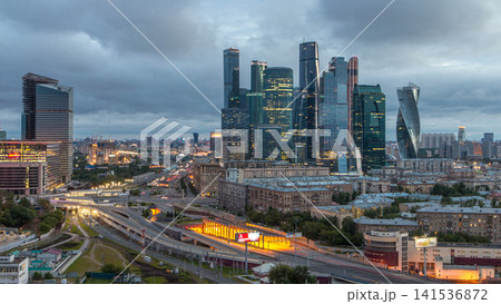 Night to day view of the city traffic timelapse and Building of Moscow International Business Center Moscow-City Night to day view of the city traffic timelapse and Building of Moscow International Business Center Moscow-City 141536872
