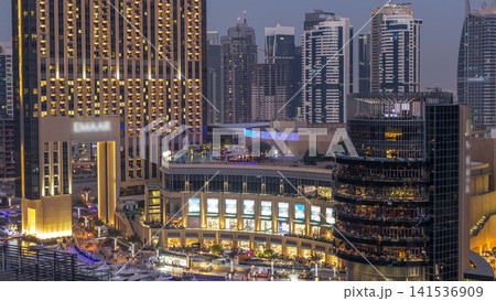 Beautiful aerial top view day to night transition timelapse of Dubai Marina canal 141536909