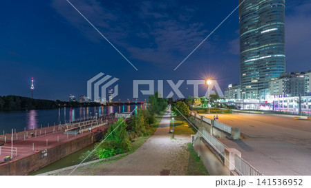 Beautiful cityscape with modern buildings day to night timelapse, the tallest skyscraper in Austria Beautiful cityscape with modern buildings day to night timelapse, the tallest skyscraper in Austria 141536952
