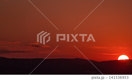 Aerial panoramic view of sunset over Vienna city with hills timelapse in Austria. Aerial panoramic view of sunset over Vienna city with hills timelapse in Austria. 141536953