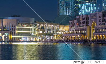 The Dancing Fountain of Dubai and lake day to night timelapse at dusk in Dubai, UAE. The Dancing Fountain of Dubai and lake day to night timelapse at dusk in Dubai, UAE. 141536999