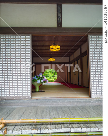 Traditional Japanese temple interior with circular window in Kamakura 141539567